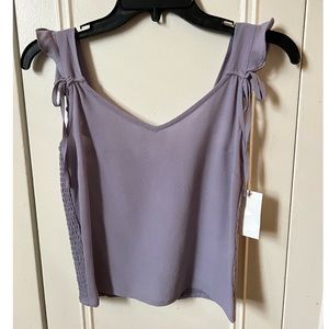 Ruffle shoulder pretty tank! Great for summer! Dress up or down!